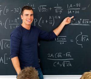 stockfresh 42800 teacher pointing at blackboard teaching mathematics sizel
