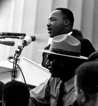 Martin Luther King Jr., delivering the "I Have a Dream" speech on the steps of the Lincoln memorial.